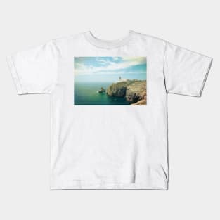 Lighthouse on top of a cliff Kids T-Shirt